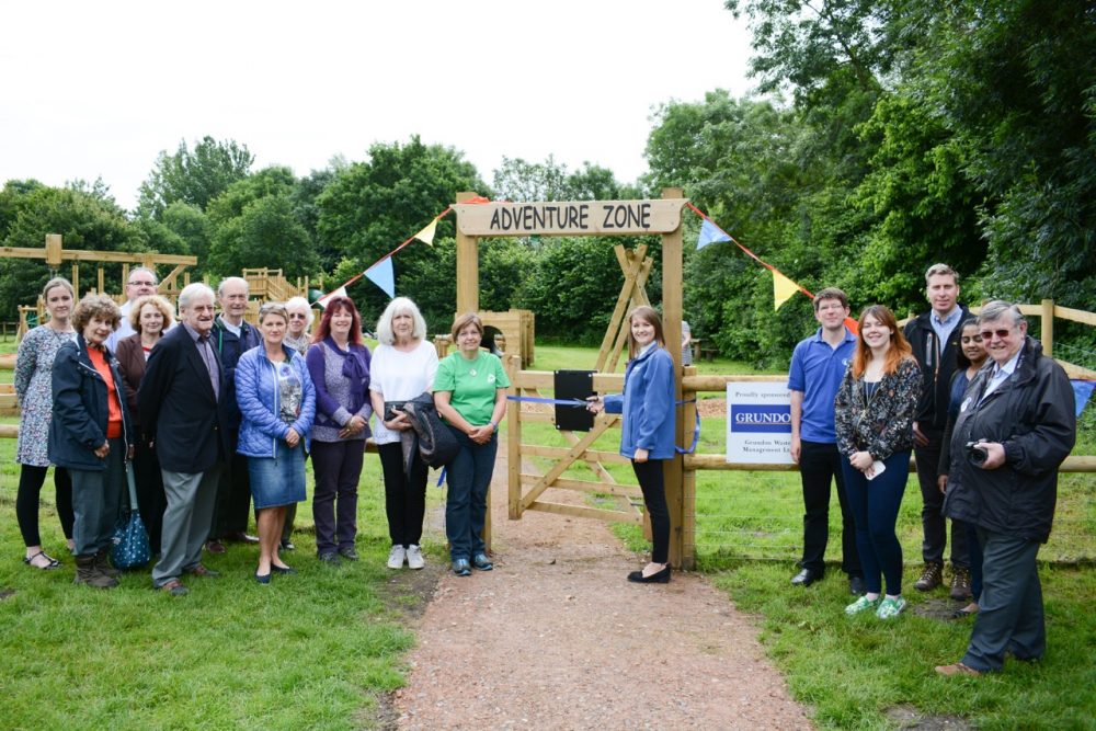 Kirsti Santer from Grundon cuts the ribbon at the playground's official opening