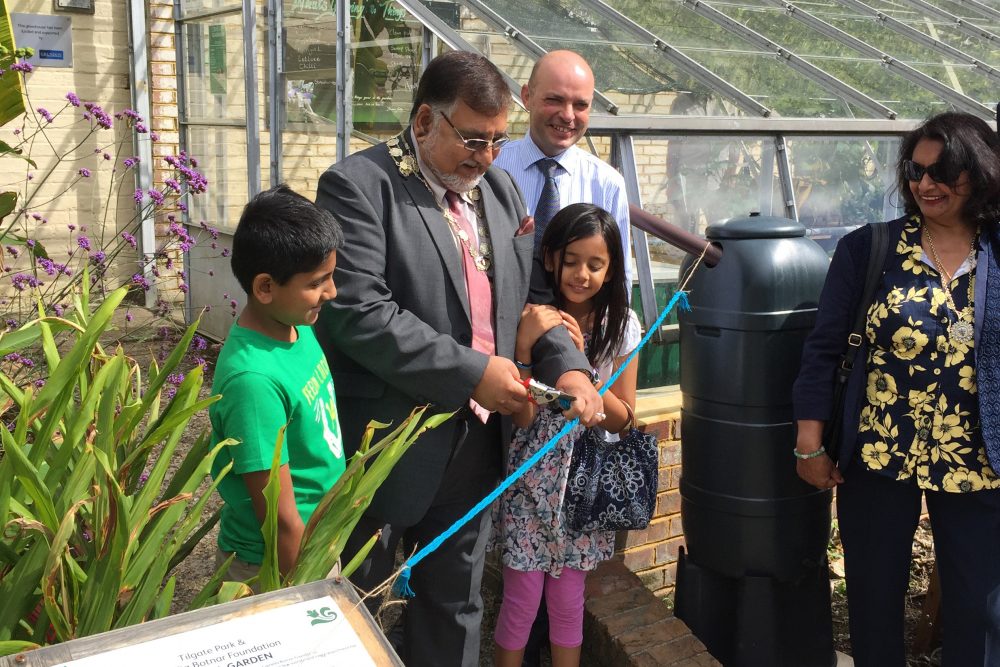 The mayor of Crawley offically declares the glasshouse open, watched by Andrew Short